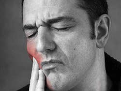 a man suffering from toothache